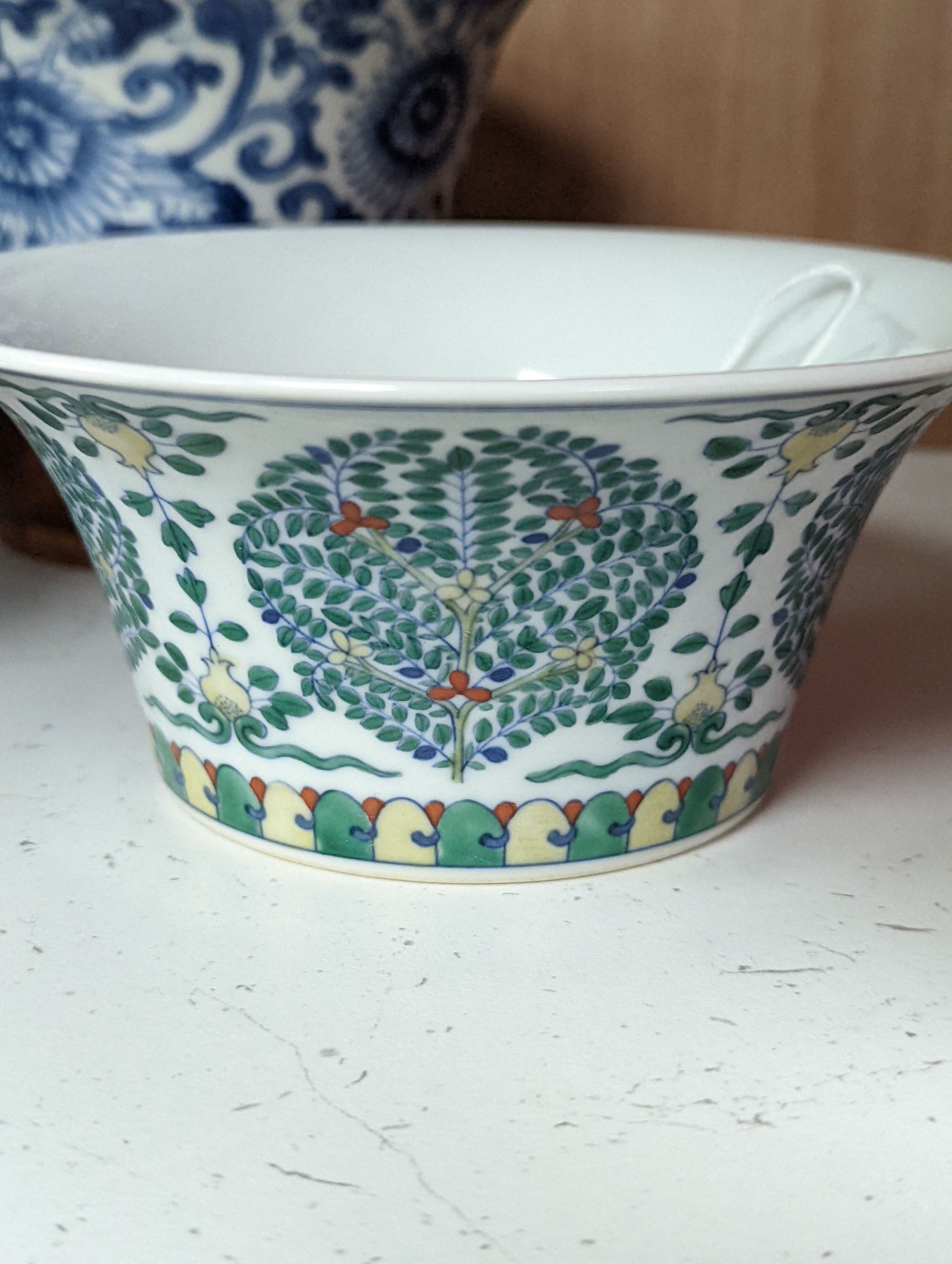 A Chinese blue and white bowl, Kangxi, 15cm. diam., a famille rose teapot stand, Yongzheng, and two doucai bowls